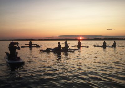 Floating Lotus SUP at sunset